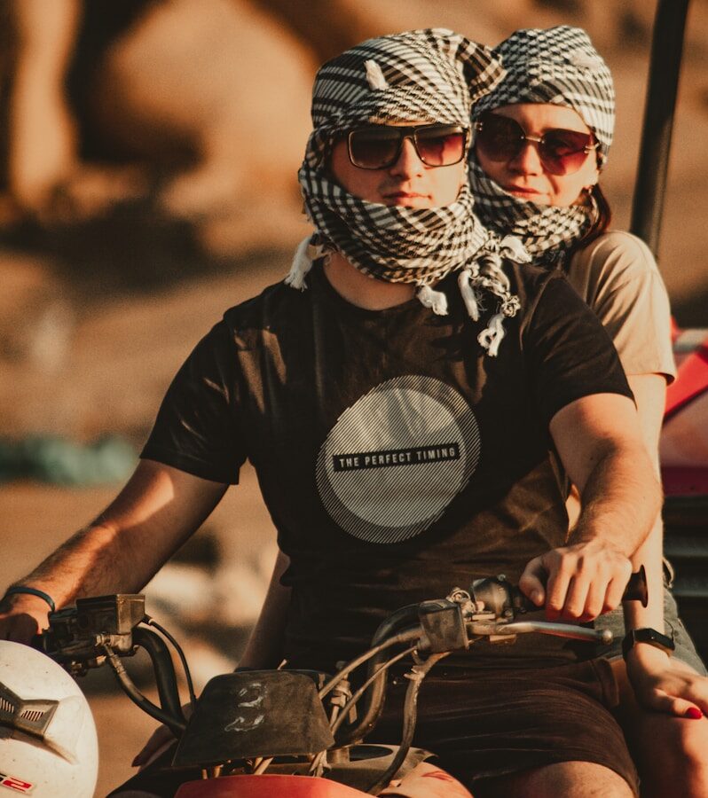 man in black crew neck t-shirt wearing white and black mask